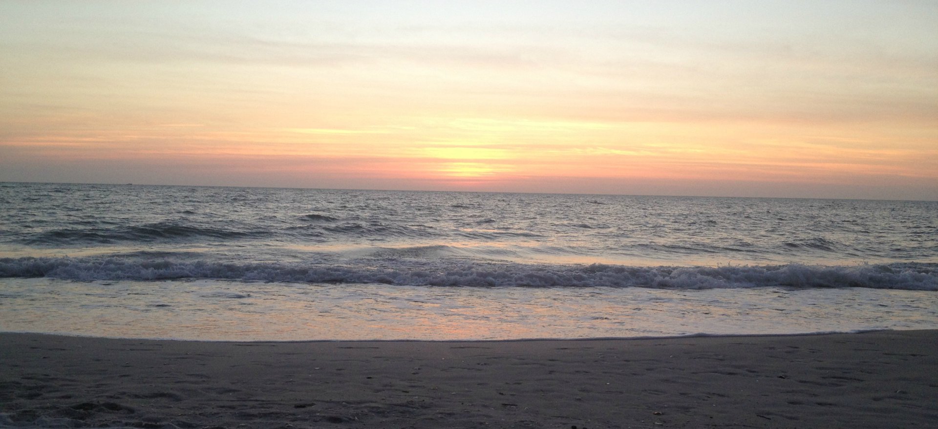 Sunset over the Gulf of Mexico from a Naples, Florida beach