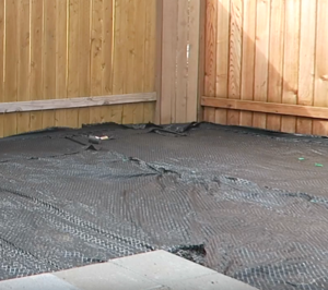 weed barrier helps you from having to constantly maintain your backyard project