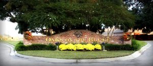 entrance of Oaks on the Bluff subdivision in Prairieville, LA