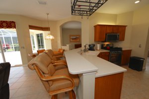 Kitchen and Table Space that overlooks the lake view - 14124 Nighthawk Terrace - Lakewood Ranch