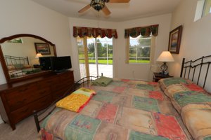 Master bedroom over looking the lanai and lake - 14124 Nighthawk Terrace - Lakewood Ranch