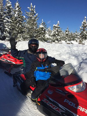 Snow sledding near Henry's Fork in Island Park ID
