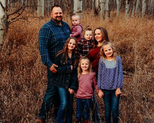 Picture of Dillion Klingler and his family in Chester Idaho