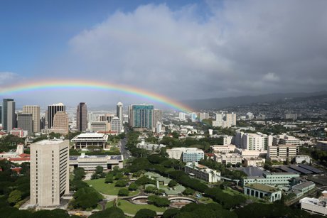 Rainbow over the Honolulu skyline and Oahu mountains