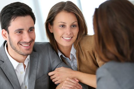 Couple meeting with a lender. 