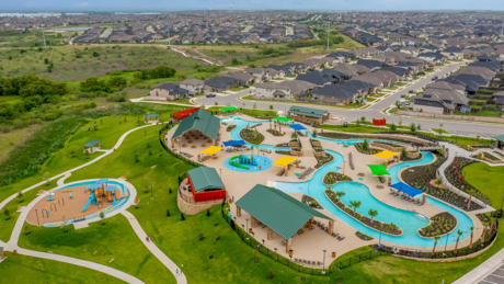 Buda Texas neighborhood with resort style pool lazy river walking trails and family friendly community amenities