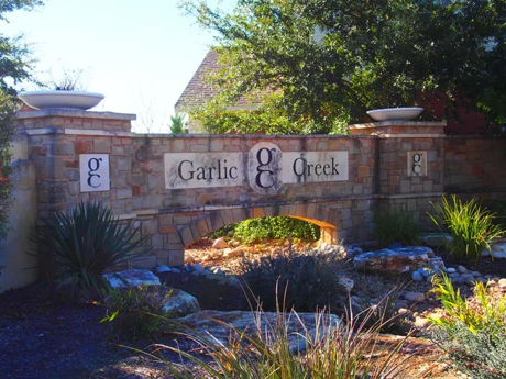 Garlic Creek neighborhood entrance sign in Buda TX