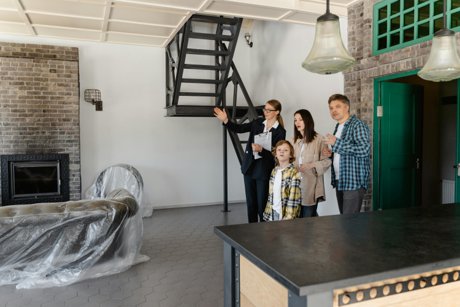 agent showing property to new homeowners