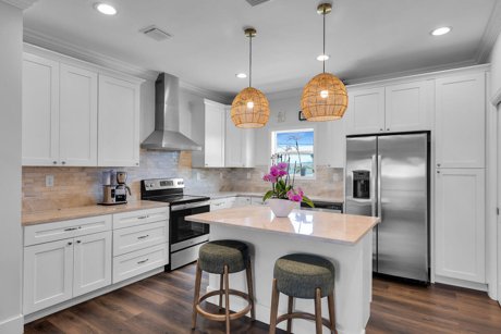 Kitchen with quartzite countertops at 29663 Saratoga Ave, Pine Channel Estates