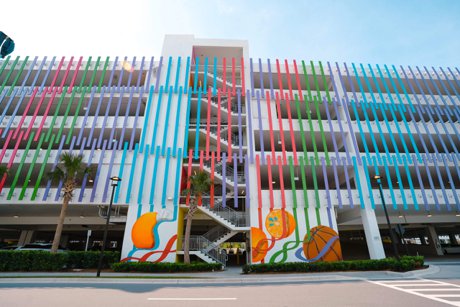 DNA Garage Mural in Lake Nona Town Center with painted helixes turning into Valencia oranges and sports balls