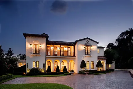 Custom estate home under construction on a golf-front lot inside Lake Nona Golf and Country Club