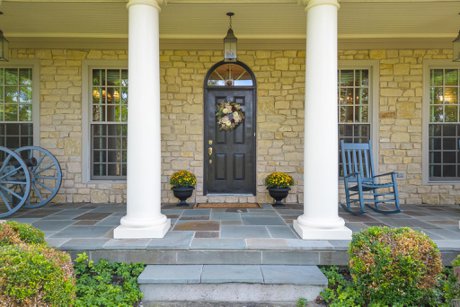 House for sale with slate front porch with columns