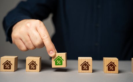 Owner managing Orlando vacation rental homes from a laptop