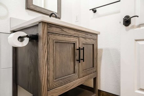 Space conscious rustic modern bathroom remodel with freestanding tub