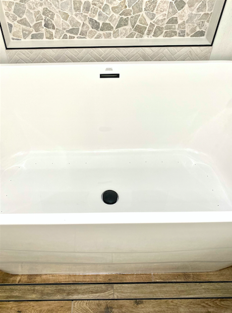 Kids bathroom with freestanding tub