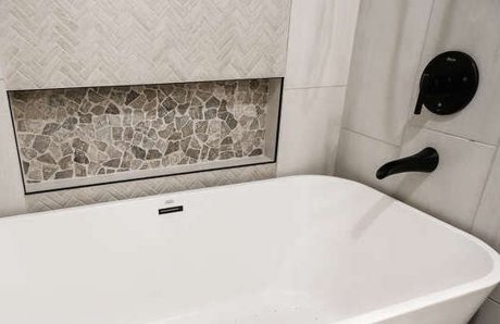 Space conscious rustic modern bathroom remodel with freestanding tub