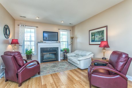 Living Room and electric fireplace 3108 Redfield dr magnolia greens