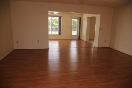 Looking from the front door to through the living room to the family room in Venice Gardens