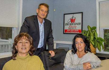 Joe Wiessner with his team of agents