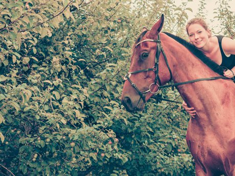 woman riding a horse