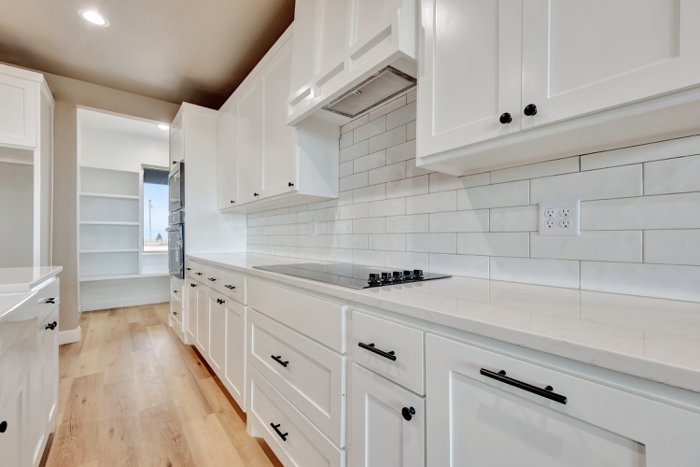 Kitchen cabinetry and finishes by Deep Canyon Homes