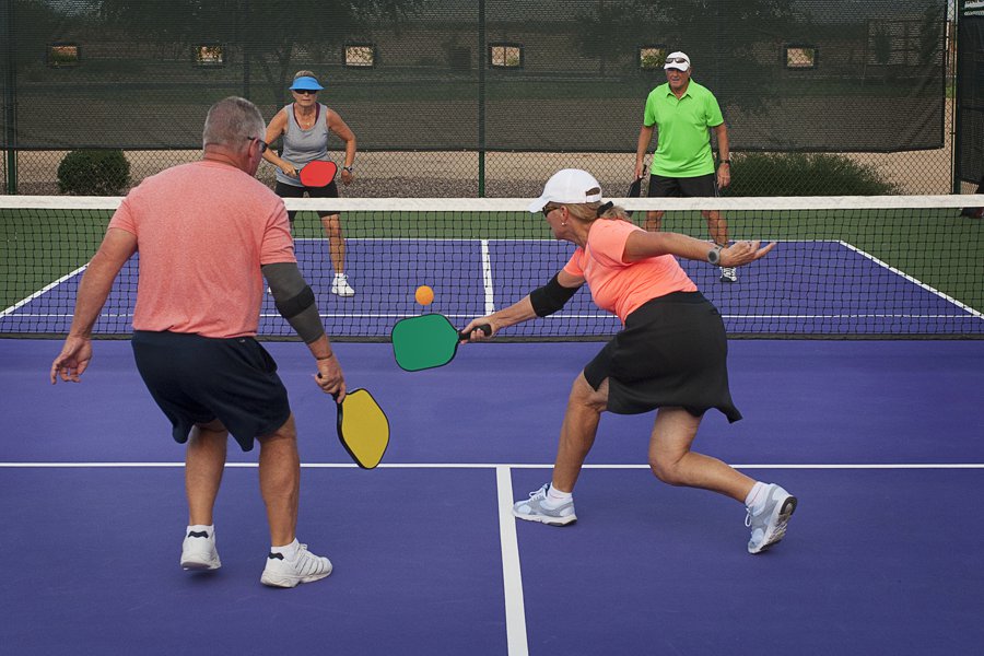 Active adults playing pickleball in Indian Land South Carolina