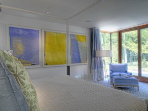 Stage your home when selling your home with neutral art on the walls. Take down personal and family pictures.