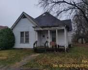 320 E 5th, Flora image