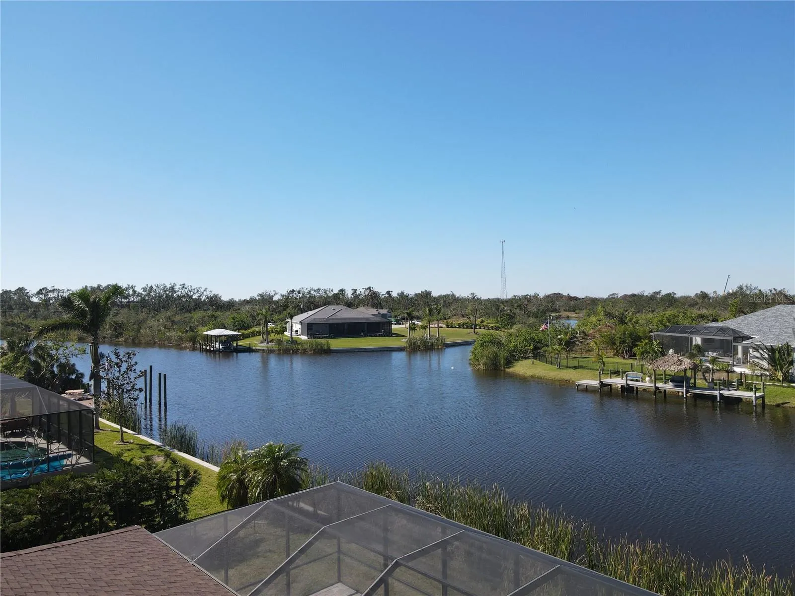Waterfront homes and private docks along a South Gulf Cove canal