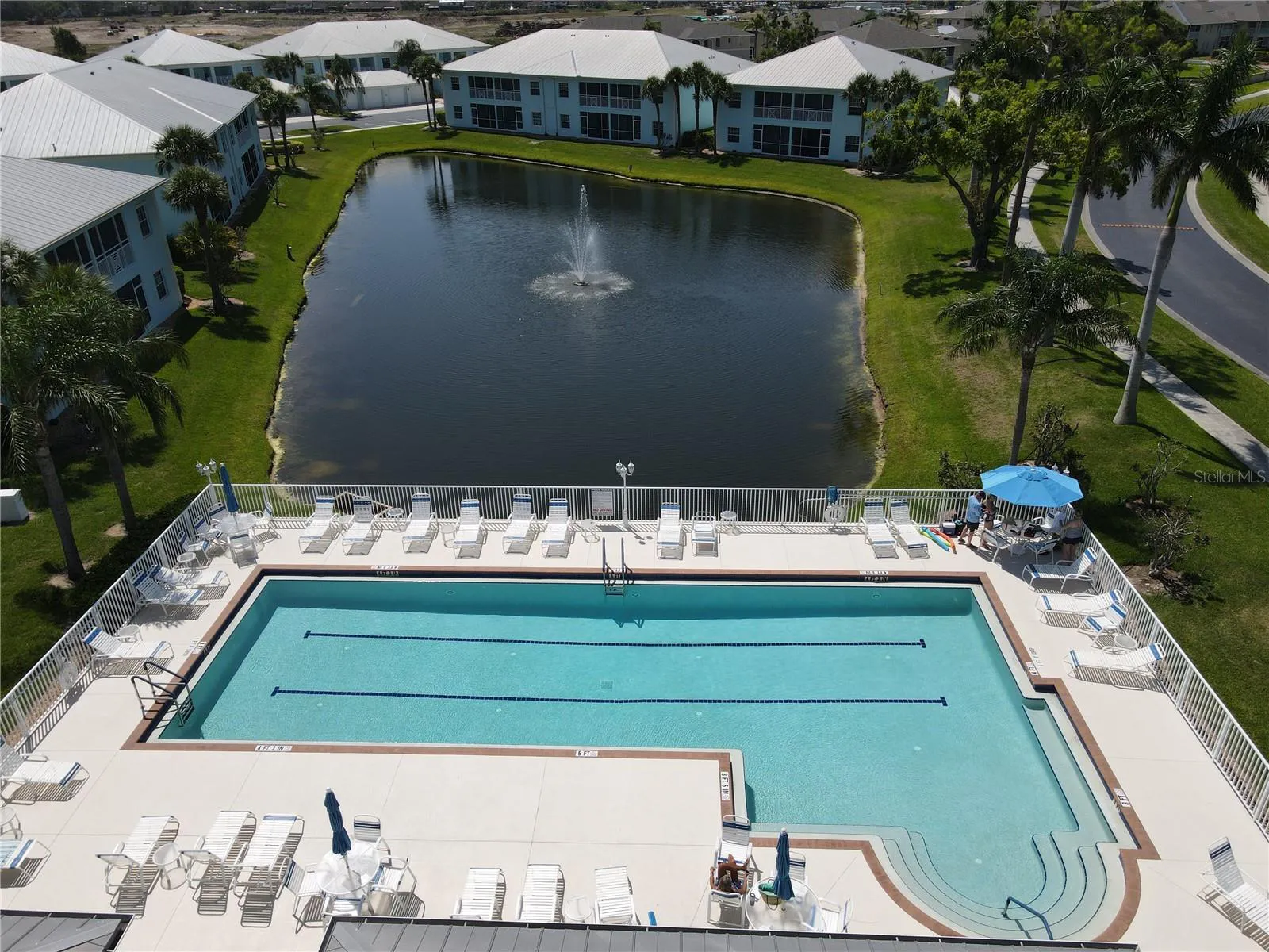 Pool and lake view at The Colony at Sabal Trace North Port Florida