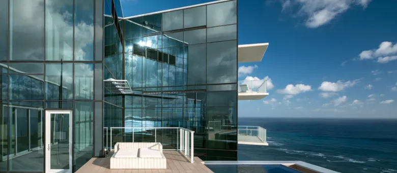 Waiea glass facade and lanai overlooking the Pacific Ocean
