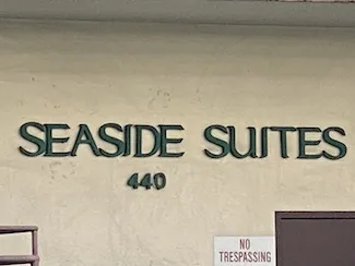 Seaside Suites Sign