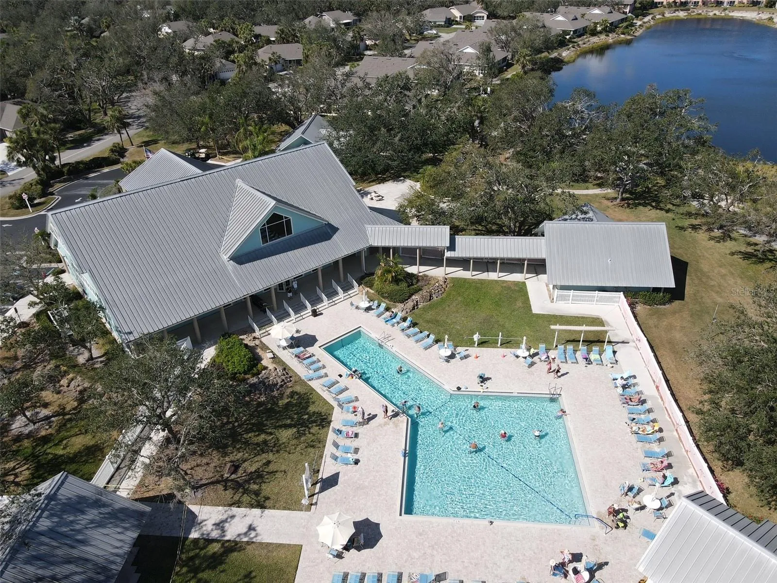 Aerial view of Heritage Oak Park pool and clubhouse in Port Charlotte