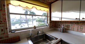 View from the kitchen window at at 5409 Azure Way, Siesta Key Florida