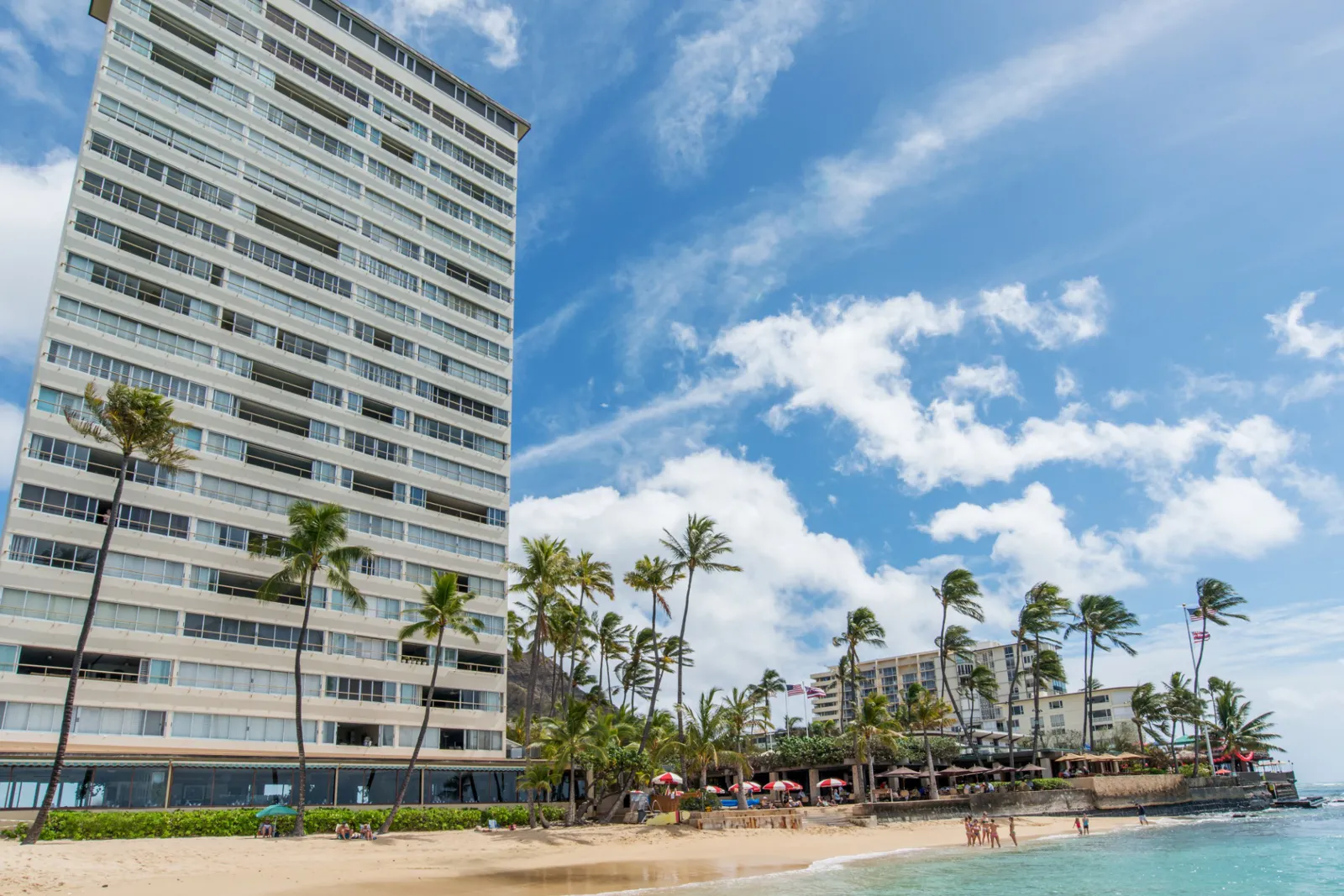 Colony Surf condominium and sandy beach on Honolulu's Gold Coast