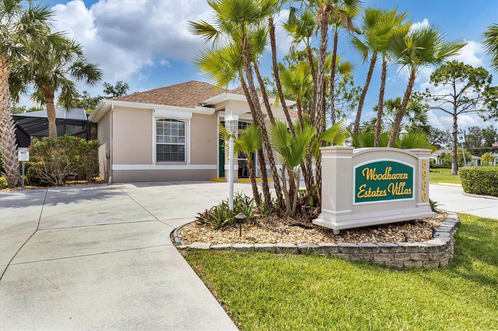 Woodhaven Estates Villas entrance and clubhouse in North Port