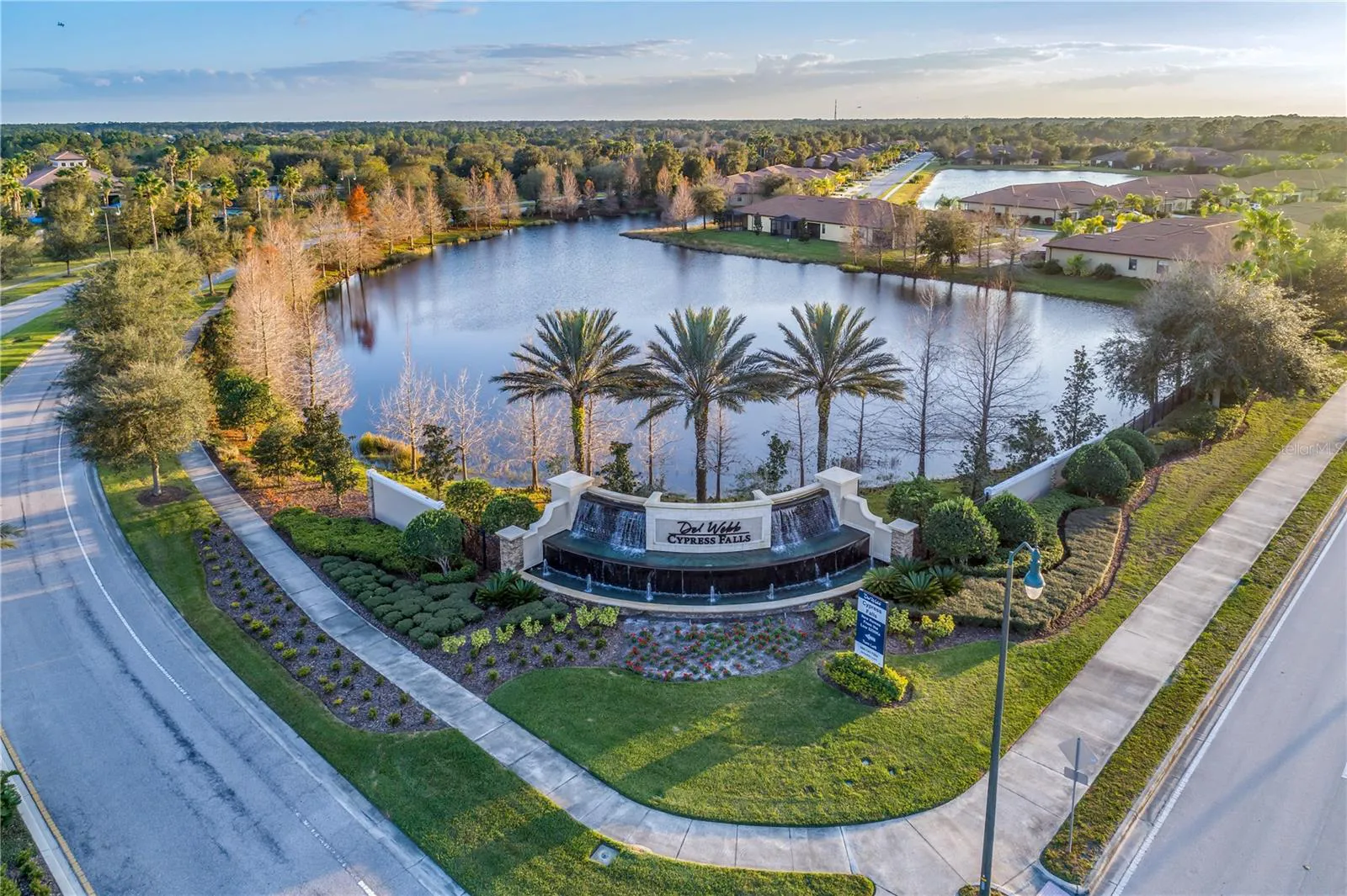 Lake and entrance aerial at Cypress Falls North Port Florida