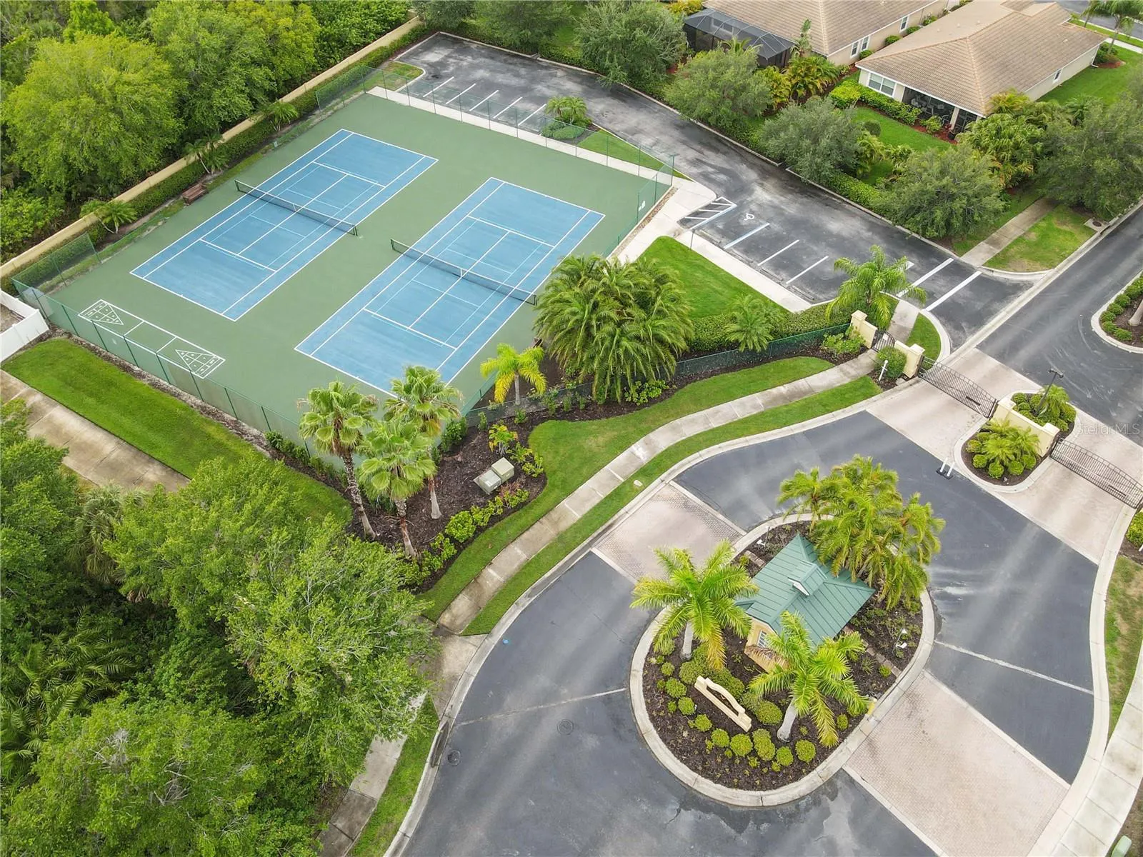 Talon Bay gated entrance and tennis courts