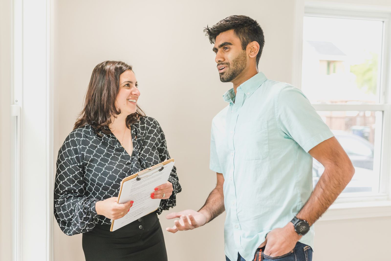 Prince William County home buyers exploring homes with a local Realtor